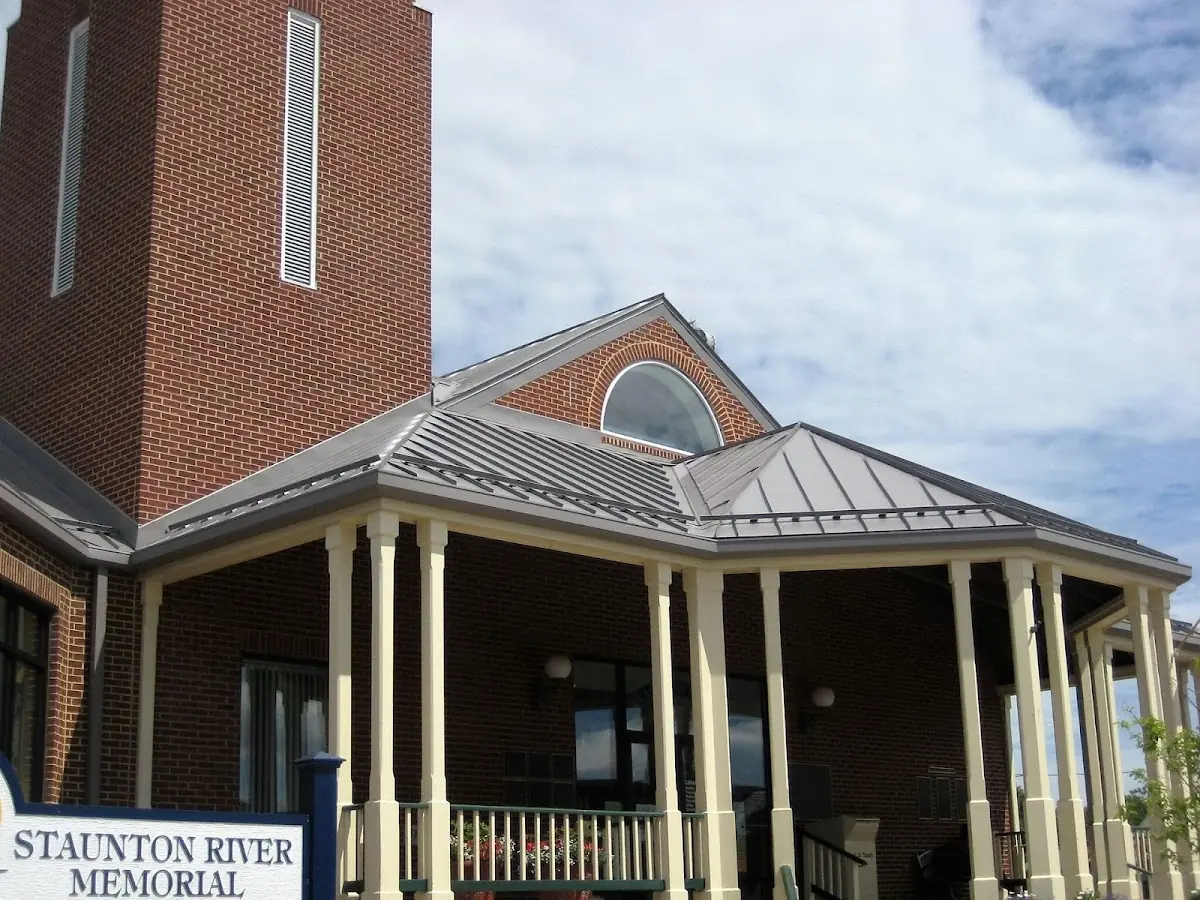 Skilled roofing craftsmen working on a residential roof in Plantersville
